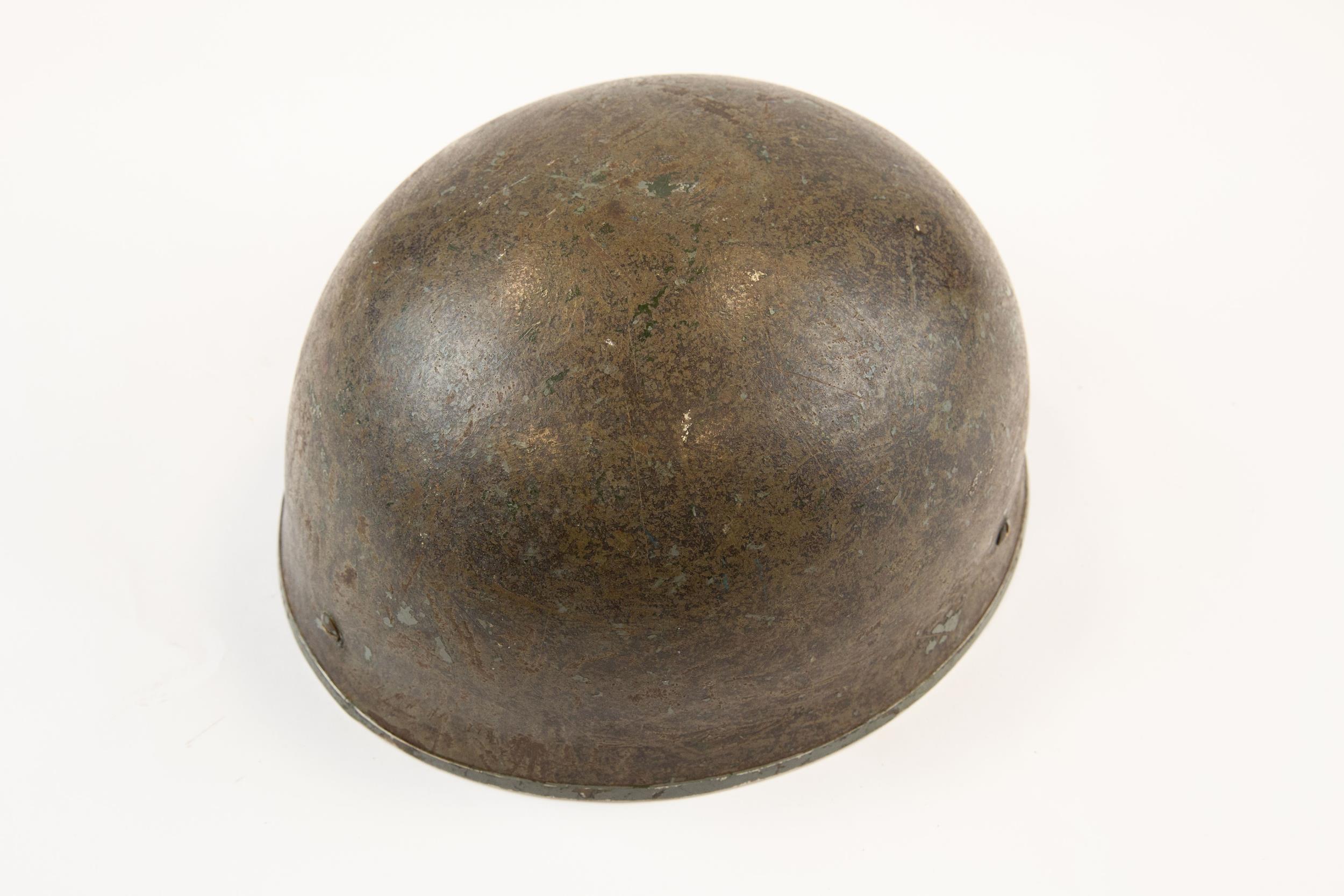 A British Parachutist's steel helmet, with foam padded liner and webbing chin strap and chin pad. GC