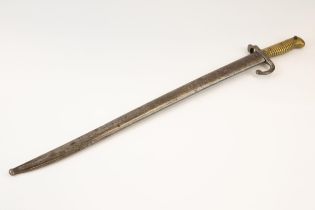 A brass hilted Chassepot type bayonet for the Remington rifle, the blade with knight's head mark, in