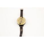 A scarce WWII German Luftwaffe pilot's wrist compass, of black bakelite and clear perspex, the