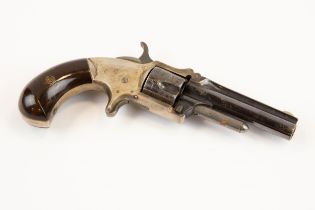A 5 shot .32" rim fire Marlin single action pocket revolver, number 7384, the 3" barrel marked "No