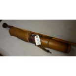 A Dyak blowpipe, together with an ornamental wooden dart quiver. GC £50-60