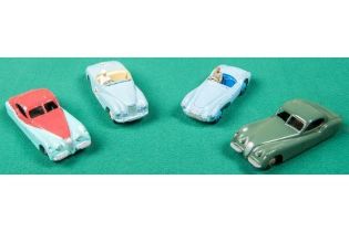 4 Dinky Toys. 2x Jaguar XK120 in dark green with light brown wheels and in turquoise and cerise with