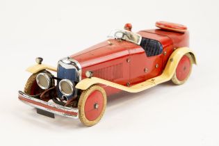 A rare 1930's No.2 Meccano Constructor Car. A boat tail example in red with cream mudguards/