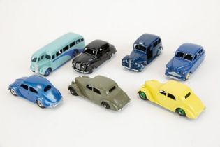7 well restored early Dinky Toys. 2x Raleigh Saloons, colour variations. Standard Vanguard, Austin
