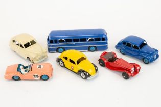 6 Dinky Toys. Duple Roadmaster Coach in dark blue, Standard Vanguard in cream, Austin Devon in