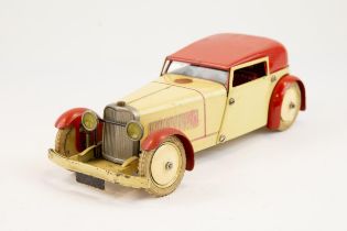 A scarce 1930's No.1 Meccano Constructor Car. An example in cream with red roof, seats and