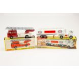 2 Dinky Toys. An A.E.C. Fuel Tanker ESSO (945). In white with red/ blue/white paper labels, an