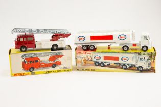 2 Dinky Toys. An A.E.C. Fuel Tanker ESSO (945). In white with red/ blue/white paper labels, an