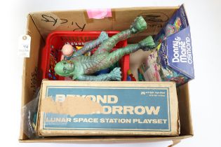 Various space and cahracter toys. Lot includes a Sears exclusive "Beyond tomorrow" lunar space