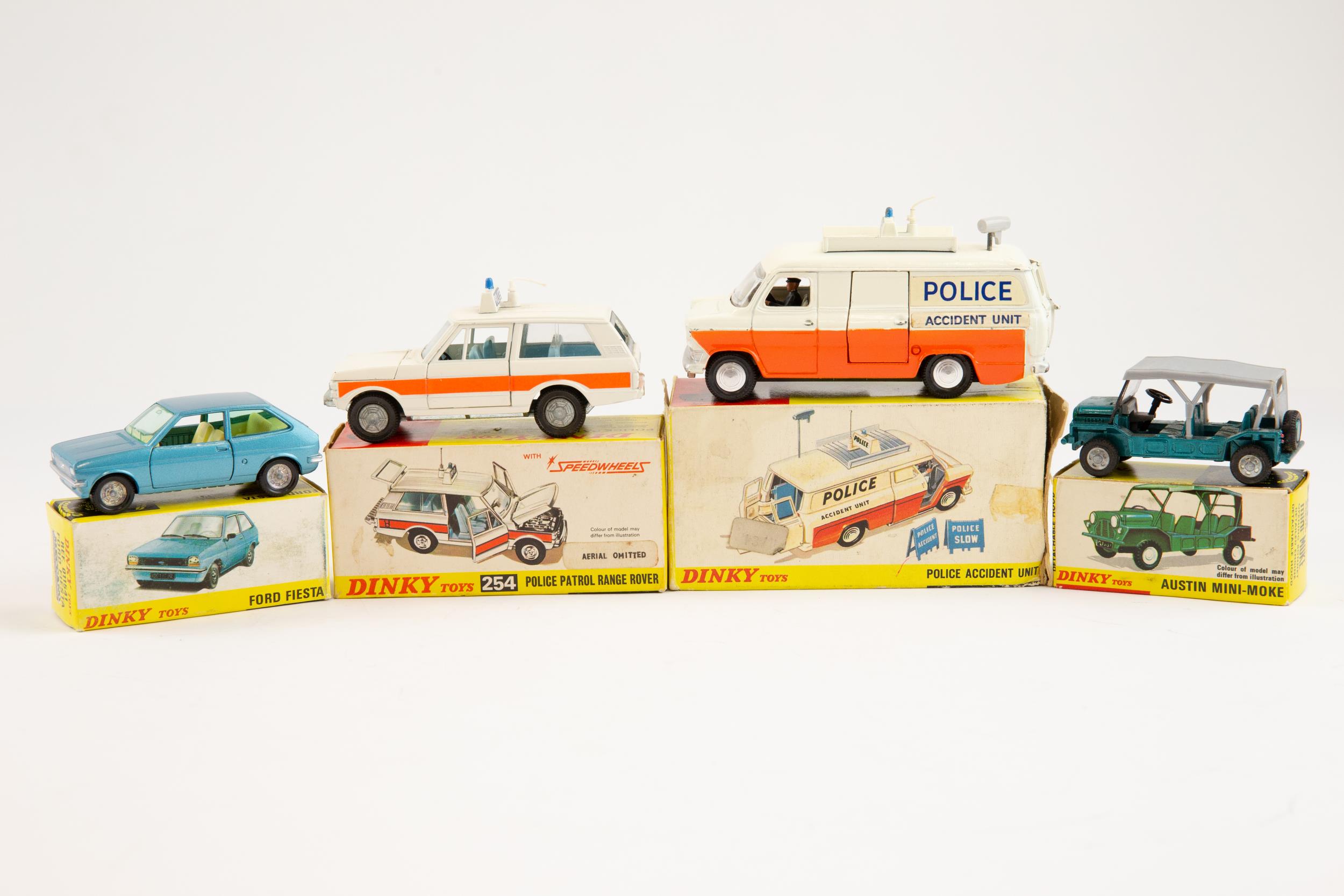 4 Dinky Toys. POLICE Patrol Range Rover (254). In white with paper orange flashes, light blue