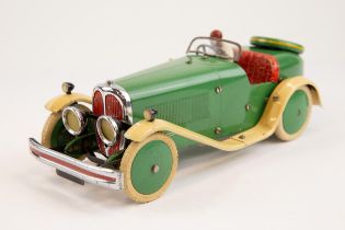 A rare 1930's No.2 Meccano Constructor Car. A short tail example in green with cream mudguards/