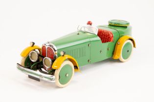 A rare 1930's No.2 Meccano Constructor Car. A boat tail example in green with yellow mudguards,