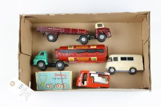 4 scarce Tri-ang Spot-on models. Includes, Morris Wadham ambulance, finished in cream with driver