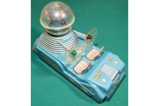 Vintage tinplate "Moon Patrol Space Ship" Toy by Nomura. Light blue body with silver grilles.