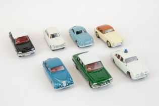 7 well restored Dinky Toys. A Daimler 2.5V8. Jaguar 3.4 POLICE, 2x Triumph 2000, Triumph Herald,