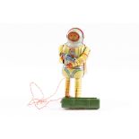 A scarce tin earth man robot toy dating from the 1950s by Nomura, made in Japan. Comes with