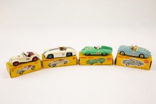 4 Dinky Toys. Sunbeam Alpine Sports (107). Light blue with cream interior. M.G. Midget Sports (108).