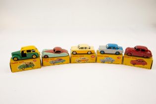 5 Dinky Toys. Austin Taxi (254), green/yellow. Austin Somerset Saloon (40j), red. Jaguar XK129 Coupe