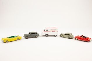 4 Dinky Toys. 2 French Dinky- Ford Vedette in dark grey with light grey wheels. Plus a Chrysler