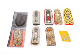 A selection of German epaulettes WWI-WWII including WWI Air Force, some badly mothed. (9) £60-80