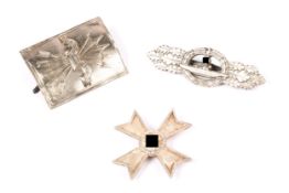 A Third Reich War Merit cross, 1st class without swords; a cast silver U boat badge by Schwerin; and