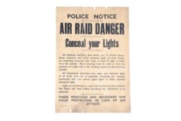A WWII Police Air Raid Warning poster, 24