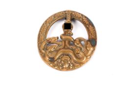 A Third Reich Anti partisan badge, of die struck brass construction with round pin. GC (slightly