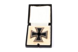A 1939 Iron Cross 1st class, the pin stamped 