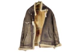 A Third Reich Luftwaffe flying jacket, sheepskin lined, similar to an Irving jacket, with eagle