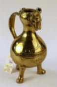 A very heavy polished brass jug, ewer, vessel marked DEVS et LVMINVS, Depicts the face of a devil by