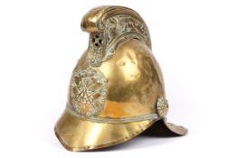 A Merryweather type fireman's brass helmet, QGC (light denting and lining wear). £200-250