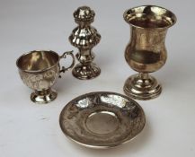 3 possibly early Russian silver items to include a pepper shaker 11cm in height, some dents, 55.29g,