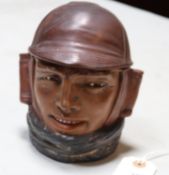 A very nice ceramic tobacco jar in the form of a military pilot, the hat shaped lid comes off, the