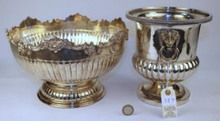 An impressive silver plated on copper punch bowl, very decorative and heavy, stamped to the base L.