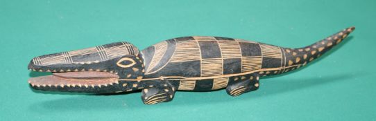 A tribal carved model of an alligator possibly from Rwanda dating from the 1960s. 43 cm in length,