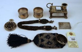 A small hallmarked silver go to bed candle holder with match box holder, 51g a possibly silver