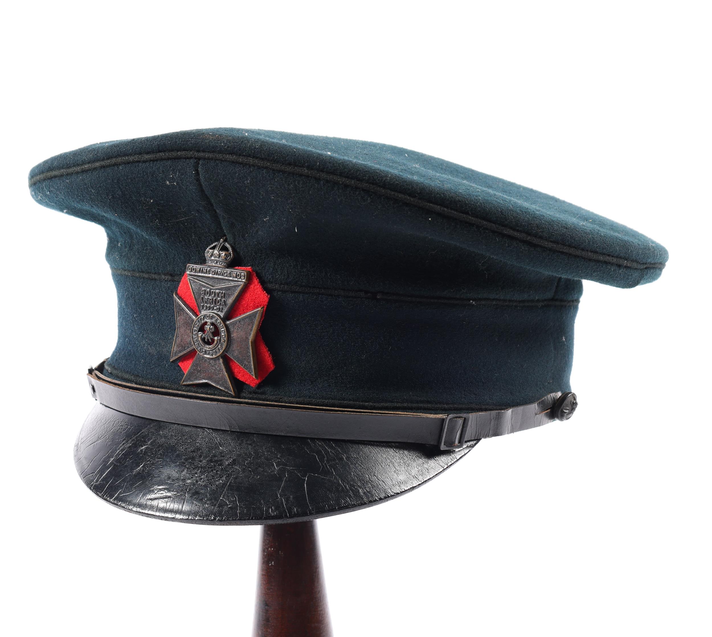 An Edwardian OR's peaked cap of the 6th Battalion City of London Regt, rifle green with blackened