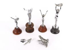 6 figural car mascots, bonnet ornaments, depicting a female in various sizes and poses. Includes a