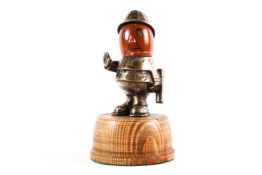 A rare Policeman Car mascot by HASSELL, nickel plated body and helmet, ceramic head some wear to the
