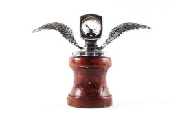 An impressively large plated winged Wilmot Breeden Calormeter. C.1920. Fixed to a large radiator