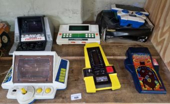 A group of six vintage hand held games comprising a Parker brothers 'wildfire' 1979, Epoch '