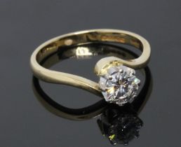 A diamond solitaire ring, the eight claw set round brilliant cut stone weighing approximately 0.64