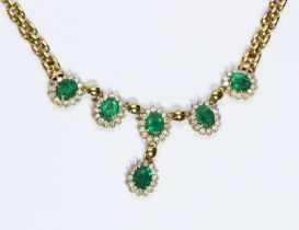 An emerald and diamond choker necklace, smooth brick link chain, marked '750', length 46cm, gross