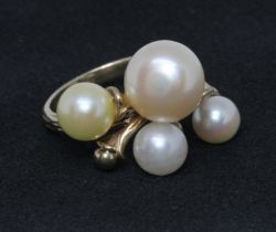 A pearl cluster ring, marked 'G14K', gross weight 6.3g, size O.