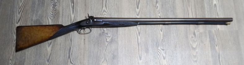 A 19th century side by side 12 bore shotgun, side 'G. Glaves. Scarbro', damascus steel barrel length