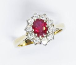 A ruby and diamond ring, the cluster measuring approx. 12mm x 10mm, hallmarked 18ct gold, sponsor '
