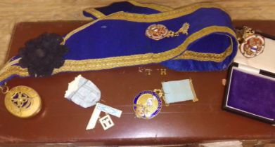 A case of Masonic regalia including one jewel marked '9ct' weight 7g, one hallmarked silver and