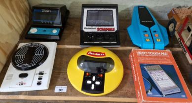 A group of six vintage hand held games comprising of a Epoch grandstand 'invader from space' 1980,