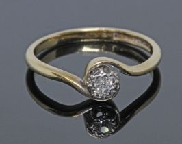 A single stone diamond ring, marked '18CT&PT' gross weight 2.2g, size K. Condition - good, minor