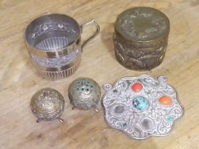 Eastern white metal comprising a pair of pepper pots, a tankard, a jar and a pendant.